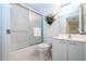 Clean bathroom with white vanity and shower/tub combo at 3780 Pinebrook Cir # 504, Bradenton, FL 34209