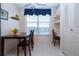 Bright dining area with built-in desk and window views at 3780 Pinebrook Cir # 504, Bradenton, FL 34209