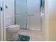 Bathroom with toilet and a walk-in shower at 3780 Pinebrook Cir # 504, Bradenton, FL 34209