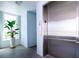 Building elevator with stainless steel doors and plant at 3780 Pinebrook Cir # 504, Bradenton, FL 34209