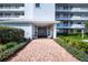Building exterior showing walkway and landscaping at 3780 Pinebrook Cir # 504, Bradenton, FL 34209