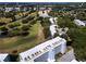 Aerial view of condo building and surrounding area at 3780 Pinebrook Cir # 504, Bradenton, FL 34209