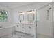 Double vanity bathroom with soaking tub and walk-in shower at 3523 Sapelo Ave, North Port, FL 34286