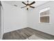 Bedroom with ceiling fan and dark gray vinyl flooring at 3523 Sapelo Ave, North Port, FL 34286
