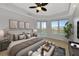 Comfortable main bedroom with a balcony and lake view at 10520 Boardwalk Loop # 401, Lakewood Ranch, FL 34202