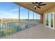 Spacious screened balcony overlooking a lake and community at 10520 Boardwalk Loop # 401, Lakewood Ranch, FL 34202