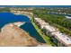 Aerial view of upscale condo community with lakefront access and golf course at 6430 Watercrest Way # 201, Lakewood Ranch, FL 34202