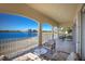 Lakefront balcony with seating area at 6430 Watercrest Way # 201, Lakewood Ranch, FL 34202