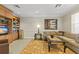 Relaxing common area with seating and a TV at 6430 Watercrest Way # 201, Lakewood Ranch, FL 34202