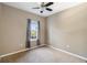 Spacious bedroom with carpeted floors and window at 5654 Simonton St, Bradenton, FL 34203