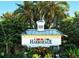 Harborage community entrance sign with lush tropical landscaping at 5654 Simonton St, Bradenton, FL 34203