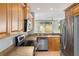 Kitchen with granite countertops and stainless steel appliances at 5654 Simonton St, Bradenton, FL 34203