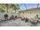 Screened patio with seating area and plants at 5654 Simonton St, Bradenton, FL 34203