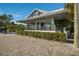 Summer House Restaurant with outdoor patio and lush greenery at 89 Beach Rd # 202 & 203, Sarasota, FL 34242