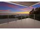 Beachfront balcony with glass railings and ocean views at 89 Beach Rd # 202 & 203, Sarasota, FL 34242