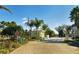 Gated community entrance with palm trees and brick pavement at 5654 Simonton St, Bradenton, FL 34203