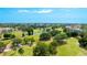 Expansive golf course view featuring mature trees and tranquil water features at 4410 Fairways Blvd # 406, Bradenton, FL 34209
