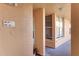 Hallway showing unit numbers and a window view at 4410 Fairways Blvd # 406, Bradenton, FL 34209