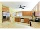 Well-maintained kitchen featuring granite countertops and stainless steel appliances at 4410 Fairways Blvd # 406, Bradenton, FL 34209