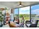 Relax on this lanai, with comfortable seating and scenic views of the lush landscape and golf course at 4410 Fairways Blvd # 406, Bradenton, FL 34209