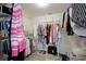 Well-organized walk-in closet providing ample storage space at 4410 Fairways Blvd # 406, Bradenton, FL 34209