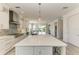 Large kitchen island with seating, perfect for casual dining or entertaining at 2314 Avenue B, Bradenton Beach, FL 34217