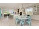 Open concept kitchen and dining area, with large island and seating at 2314 Avenue B, Bradenton Beach, FL 34217