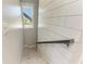 Modern staircase with wood steps and shiplap walls at 2314 Avenue B, Bradenton Beach, FL 34217