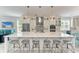 Spacious kitchen with large island, stainless steel appliances, and white cabinetry at 2314 Avenue B, Bradenton Beach, FL 34217