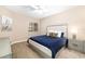 Comfortable bedroom with natural light and a ceiling fan for extra comfort at 611 Riviera Dunes Way # 108, Palmetto, FL 34221