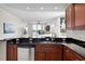 Beautiful kitchen with open access to the living area and water views at 611 Riviera Dunes Way # 108, Palmetto, FL 34221