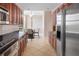 Spacious kitchen with stainless appliances and open access to the breakfast area at 611 Riviera Dunes Way # 108, Palmetto, FL 34221