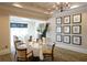 Charming dining room with tables set for a lovely meal at 6503 Stone River Rd # 109, Bradenton, FL 34203