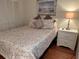 Guest bedroom with a double bed and neutral colored bedding at 6503 Stone River Rd # 109, Bradenton, FL 34203