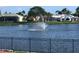 Peaceful lake view with fountain and homes at 6503 Stone River Rd # 109, Bradenton, FL 34203