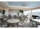 Community room with tables, chairs, and a TV at 6503 Stone River Rd # 109, Bradenton, FL 34203