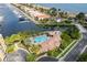 Resort-style pool and clubhouse, aerial view at 611 Riviera Dunes Way # 108, Palmetto, FL 34221