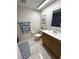 Full bathroom featuring a vanity, toilet, and shower at 6503 Stone River Rd # 109, Bradenton, FL 34203