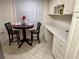 Small kitchen nook with table and chairs at 6503 Stone River Rd # 109, Bradenton, FL 34203