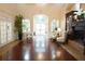 Bright and spacious lobby with hardwood floors and fireplace at 6503 Stone River Rd # 109, Bradenton, FL 34203