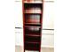 Well-built wooden bookshelves in a closet at 8389 Wingate Dr # 2322, Sarasota, FL 34238