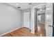 Light-filled bedroom with hardwood floors and a closet at 2102 6Th St, Sarasota, FL 34237