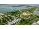 Bird's-eye view of a waterfront home in a residential area at 590 Hibiscus Way, Longboat Key, FL 34228