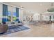 Community clubhouse with kitchen, seating, and large windows at 5565 Long Shore Loop, Sarasota, FL 34238