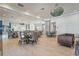 Elegant dining area in community clubhouse with ample seating at 5565 Long Shore Loop, Sarasota, FL 34238