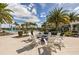 Fire pit with surrounding seating for relaxing evenings at 5565 Long Shore Loop, Sarasota, FL 34238