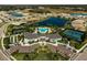 Community clubhouse with pool, tennis courts at 5565 Long Shore Loop, Sarasota, FL 34238
