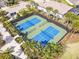 Two pickleball courts with green and blue surfaces at 5565 Long Shore Loop, Sarasota, FL 34238