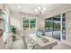 Spacious home office with pool view at 5565 Long Shore Loop, Sarasota, FL 34238
