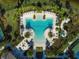 Relax by the community pool with plenty of lounge chairs at 5565 Long Shore Loop, Sarasota, FL 34238